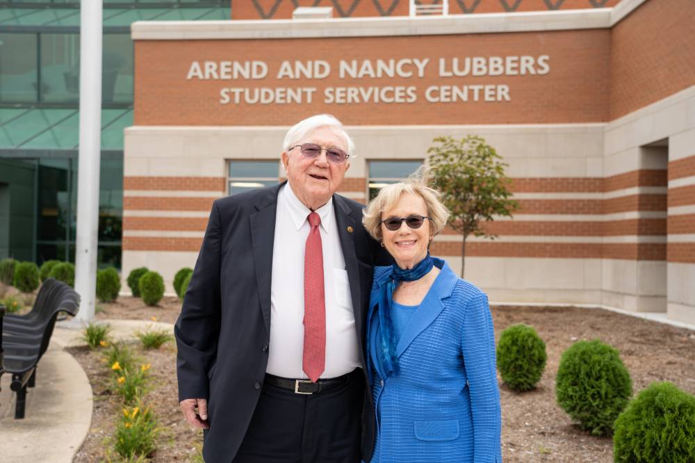 President Emeritus Arend and Nancy Lubbers in front of the Arend and Nancy Lubbers Student Services Center